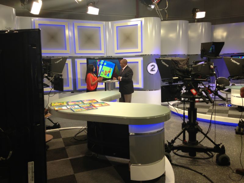 Kidscatchup workbook presented in a television studio